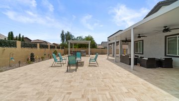Pavers or Travertine Tiles vs. Stamped Concrete: Making the Right Choice for Your Outdoor Oasis